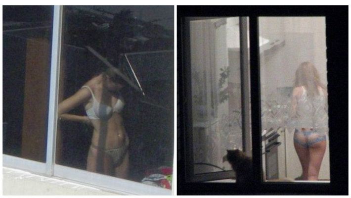 Девушка раздевается в окне